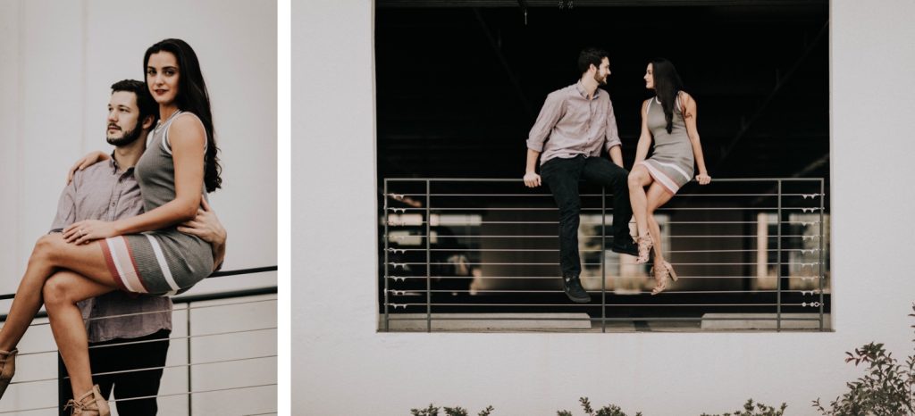 couples photos in a parking deck during their at-home engagement