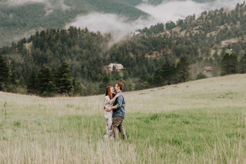Boulder engagement photos taken on a foggy day with cloud inversions in the foothills