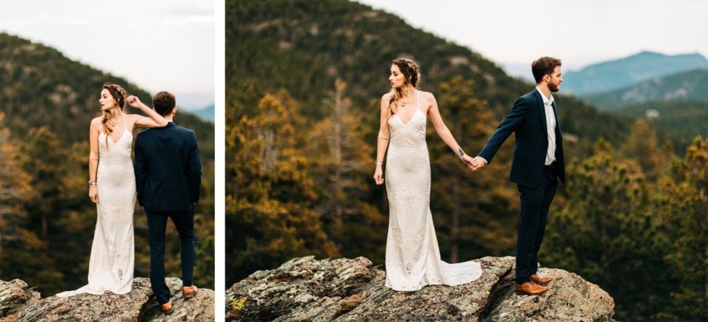 couple standing on a mountain cliff in the Rocky Mountains during their camper van elopement wedding