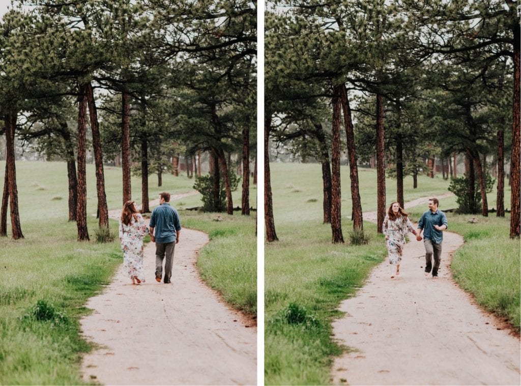 engaged couple running down a hiking trail in Boulder together
