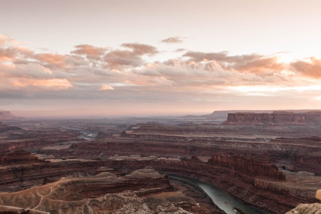sunset over the Colorado River in the desert of Moab Utah