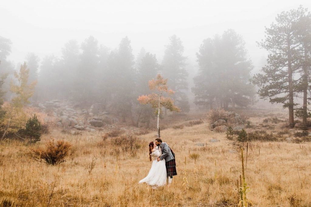 Estes Park adventure elopement with thick fog surrounding the mountains