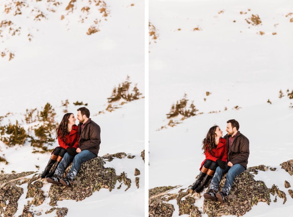 couple hiking a mountain during their snowy Colorado engagement photos in the Rocky Mountains of Colorado