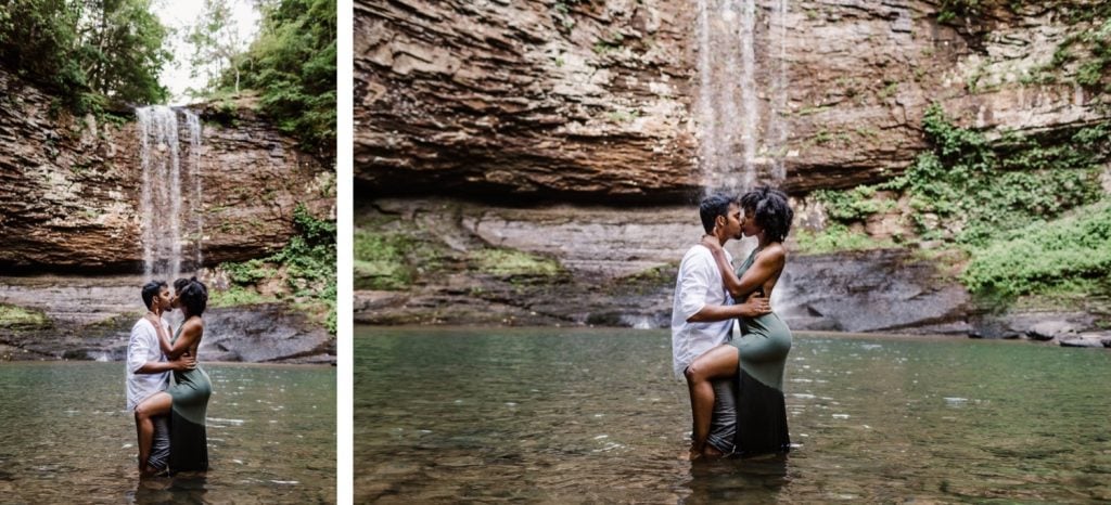 engaged couple playing in waterfall during their waterfall engagement photos