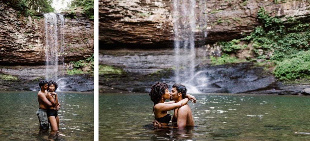 engaged couple playing in the water during their waterfall engagement photos