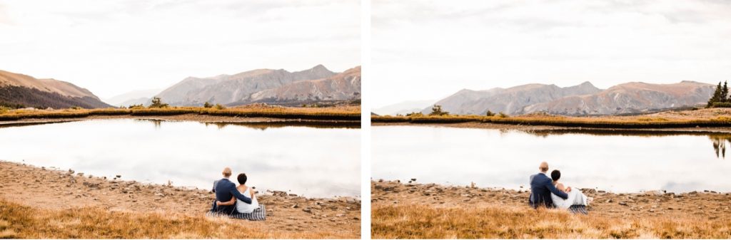 couple snuggling by a mountain lake during their Rocky Mountain post-wedding adventure session in Estes Park