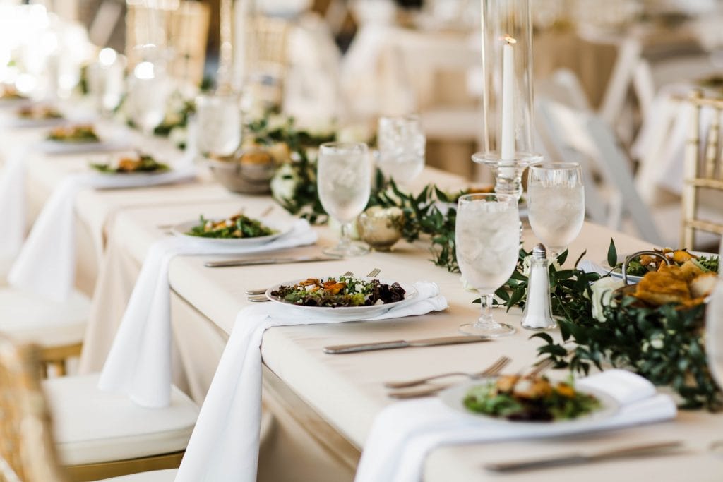 Good example of small wedding table decor and greenery