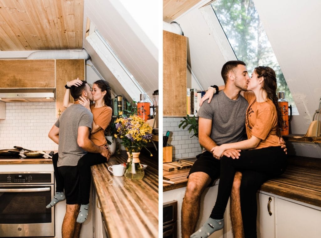 couple cooking breakfast in an a-frame cabin after their Mount Rainier elopement | Washington state elopement adventure wedding in the mountains