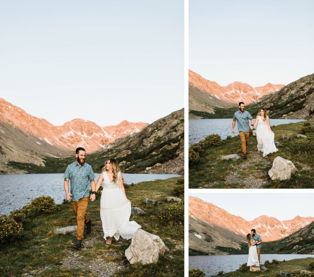 engaged couple running together in the mountains during their Breckenridge adventure engagement photos at an alpine lake | Breckenridge elopement and wedding photographers
