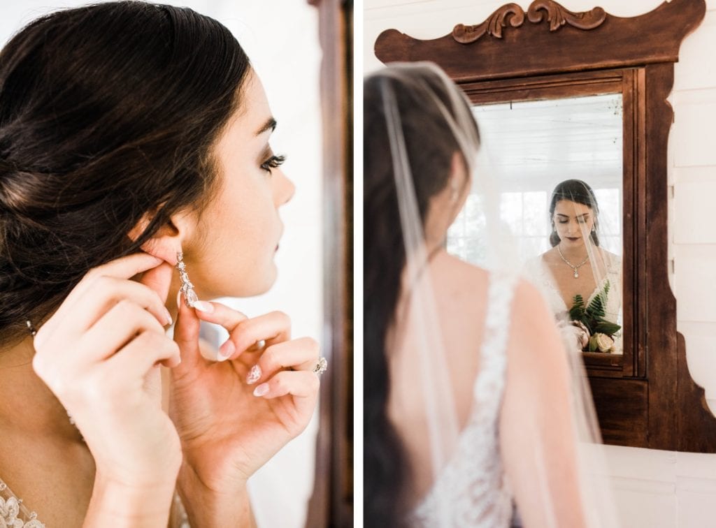 bride putting on her earrings in the cottage at Dunaway Gardens