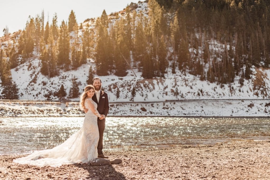 couple admiring the view of Lake Dillon before they getting married at Sapphire Point Overlook