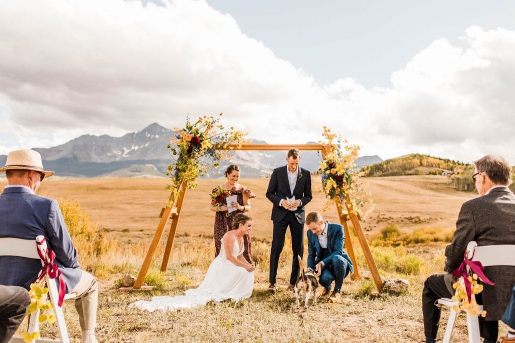 ring exchange during a mountainous Telluride wedding ceremony at a horse ranch on Wilson Mesa