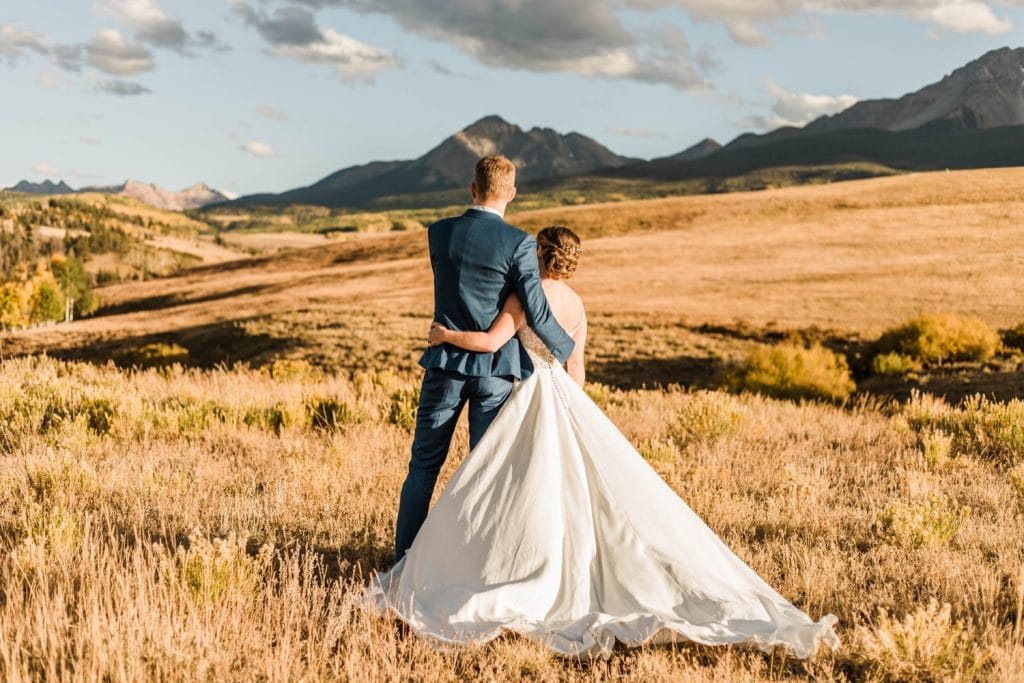 adventurous couples photos taken at sunset during a small Telluride wedding at a ranch on Wilson Mesa | photographed by Telluride Colorado wedding photographers