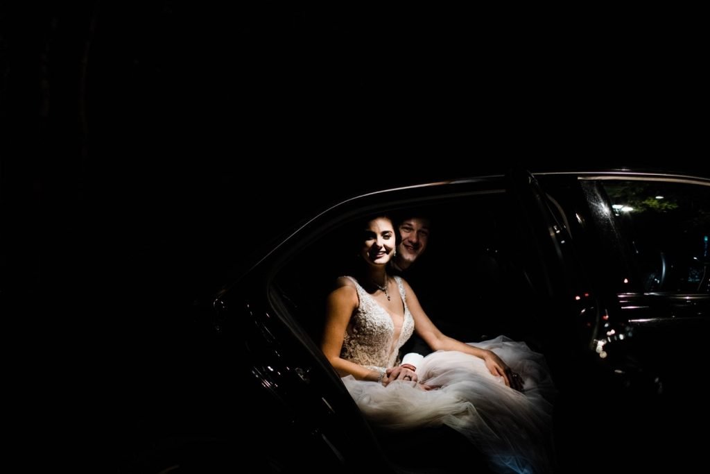 couple getting in limo after their Dunaway Gardens wedding