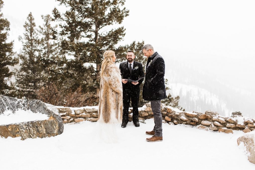 snowy winter Sapphire Point elopement ceremony