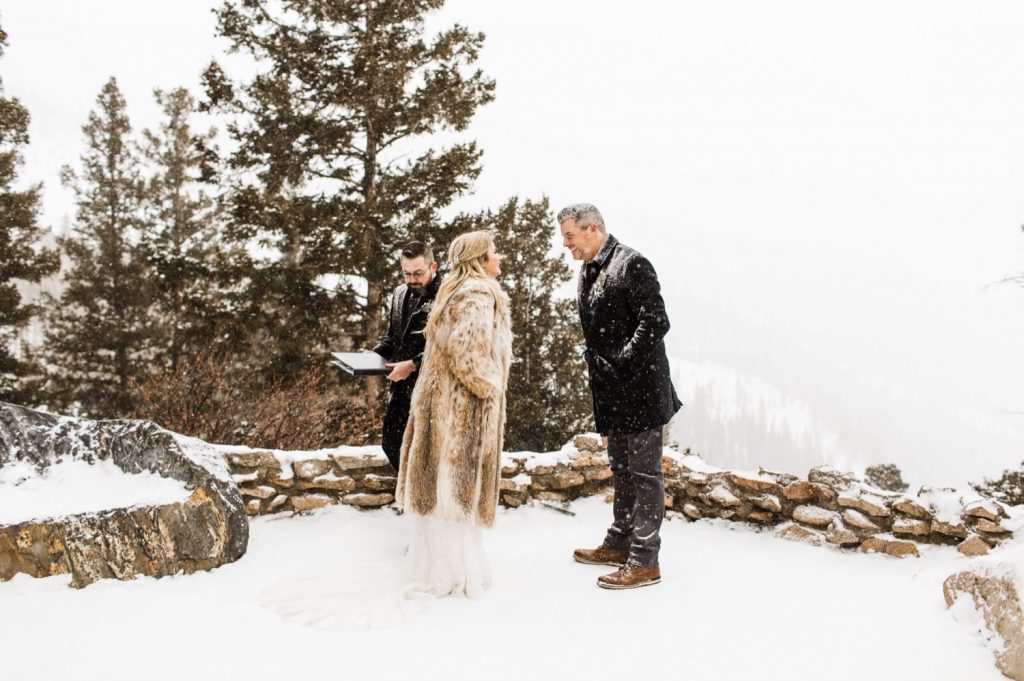 snowy winter Sapphire Point elopement ceremony