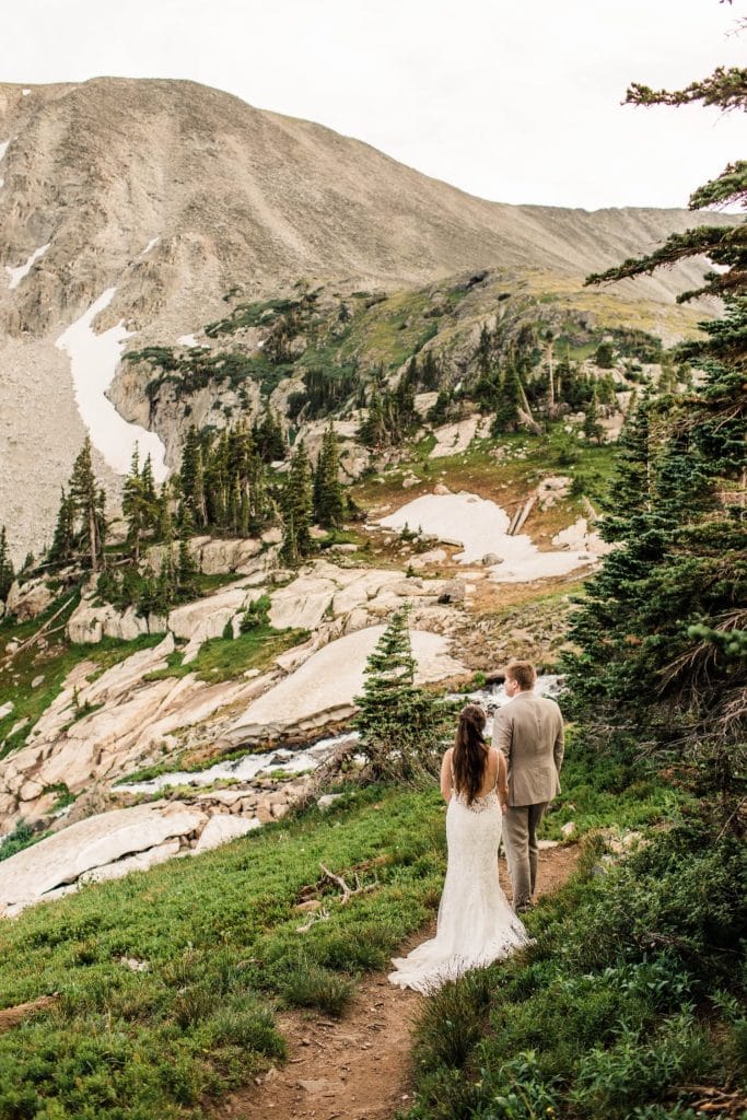hiking wedding photos taken by Colorado mountain wedding photographers
