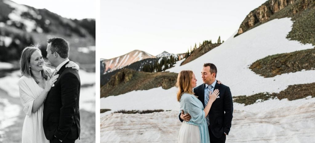 eloping couple snugging up together to stay warm during their sunrise Telluride elopement