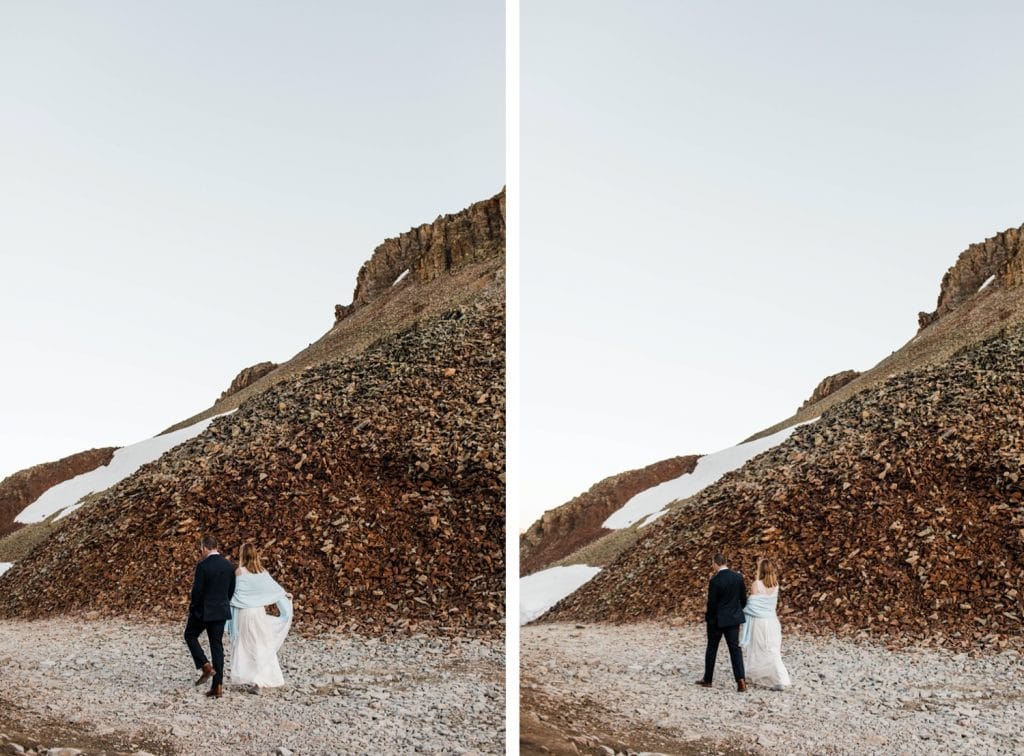 eloping couple hiking down a trail during their Telluride elopement