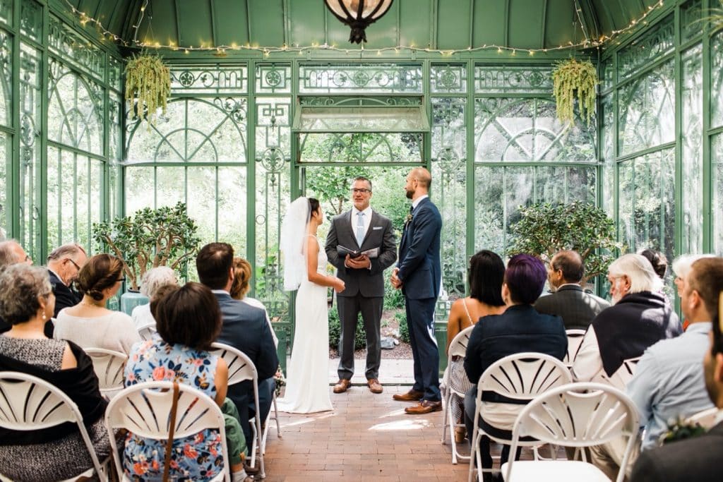 small Denver Botanic Gardens wedding ceremony in a greenhouse