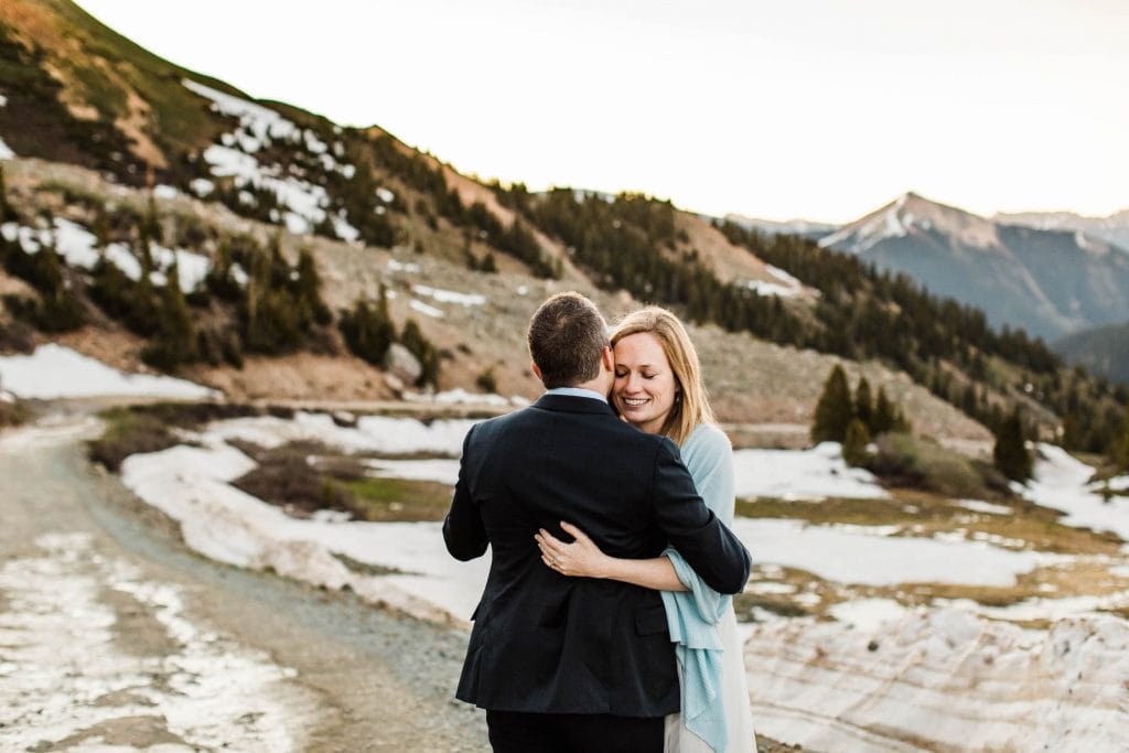 Telluride elopement photo of a couple dancing together on a mountain pass