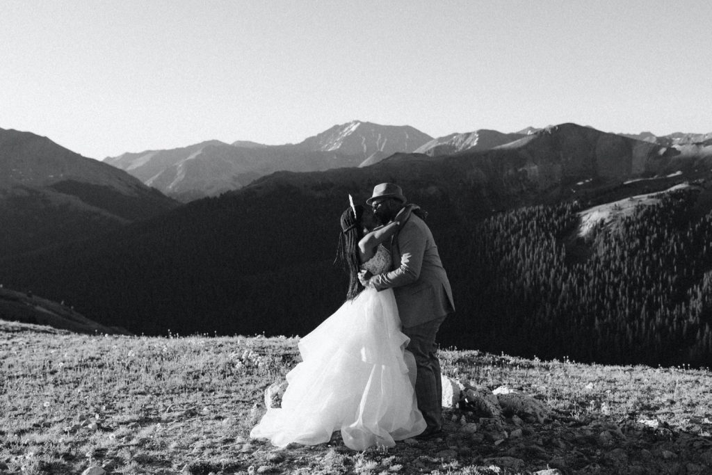 Aspen Colorado elopement first kiss