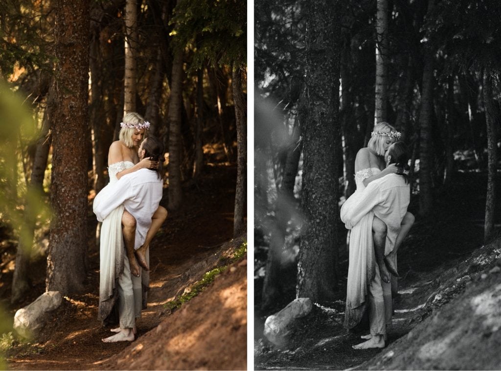 groom lifting the bride for a kiss in the forest after their elopement wedding