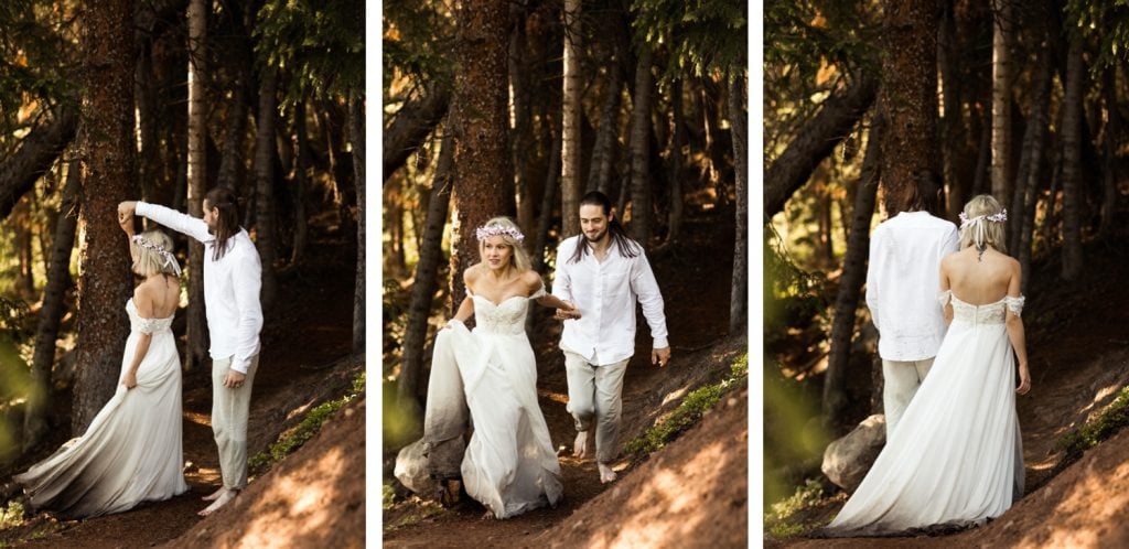 eloping couple hiking through the forest after their wedding