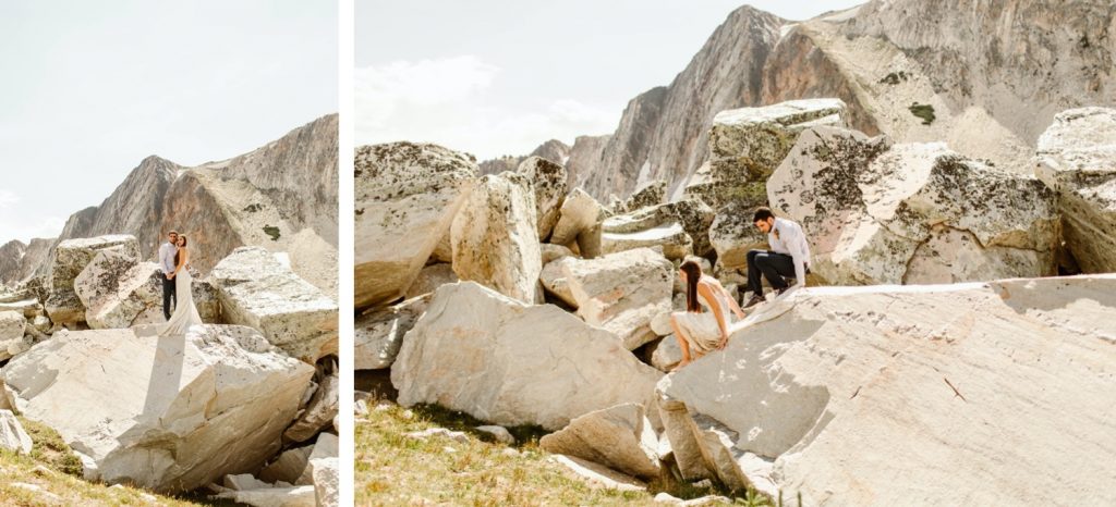 couple climbing down a mountain during their Snowy Range Wyoming elopement photos