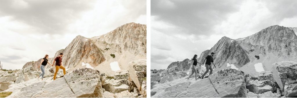 engaged couple hiking up the mountain during their mountain engagement photos