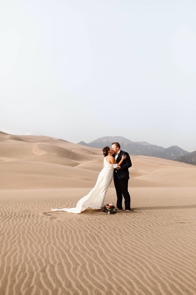 Great Sand Dunes National Park elopement first kiss