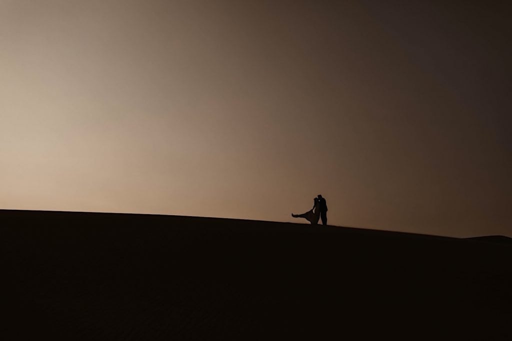 silhouette of Great Sand Dunes National Park elopement couple