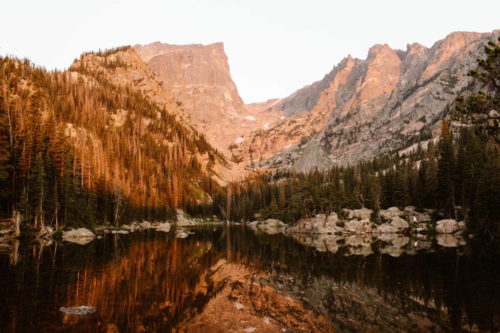 view of alpenglow at Dream Lake one of the best things to do in Rocky Mountain National Park
