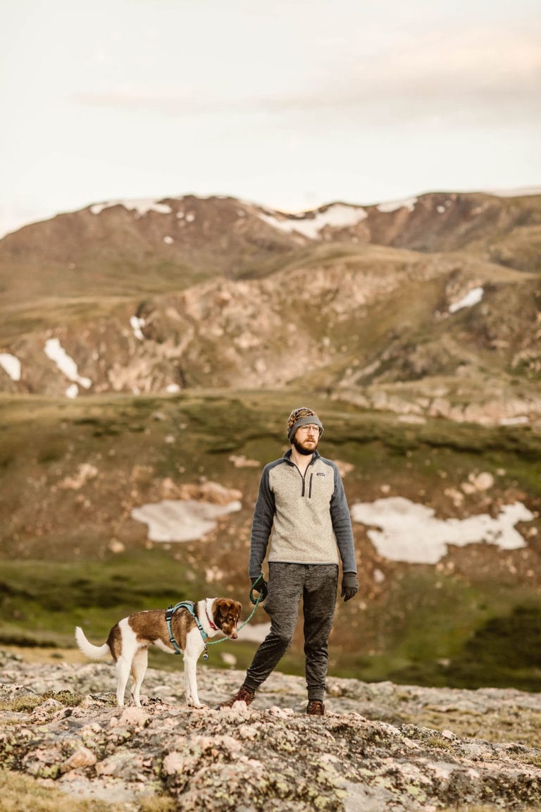 man and his dog hiking Silver Dollar Lake trail at dawn