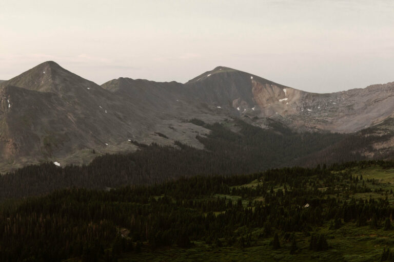 Colorado mountains at dawn alongside a mountain pass