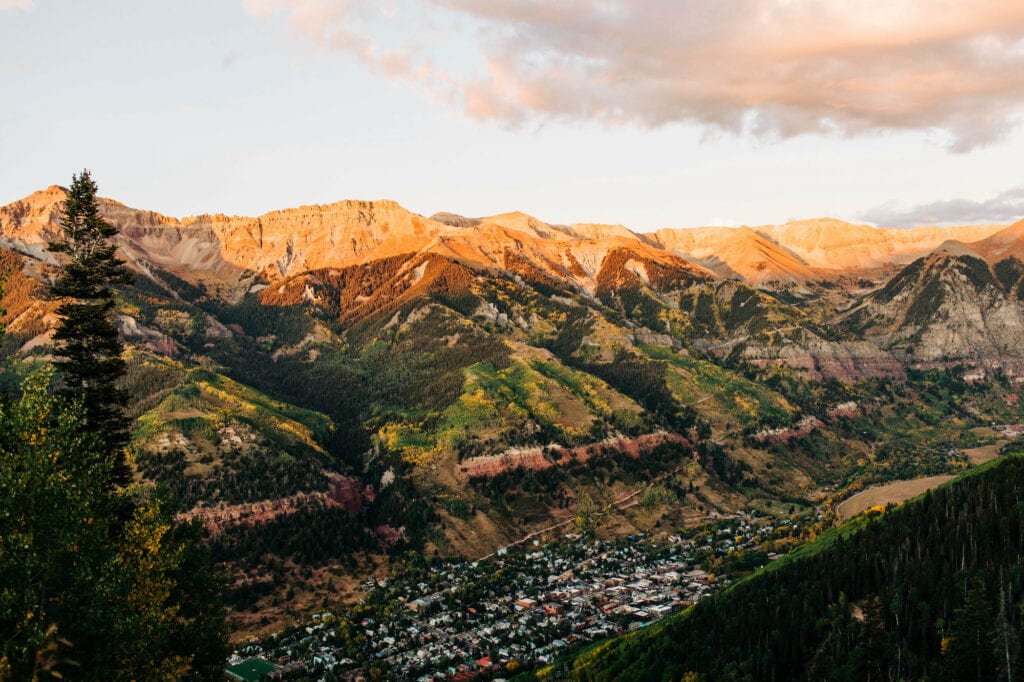 view of Telluride in the fall at sunset from the San Sophia Overlook gondola stop