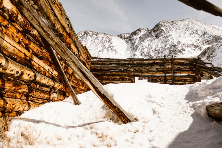 cabin ruins covered in snow at the Boston Mine in Colorado