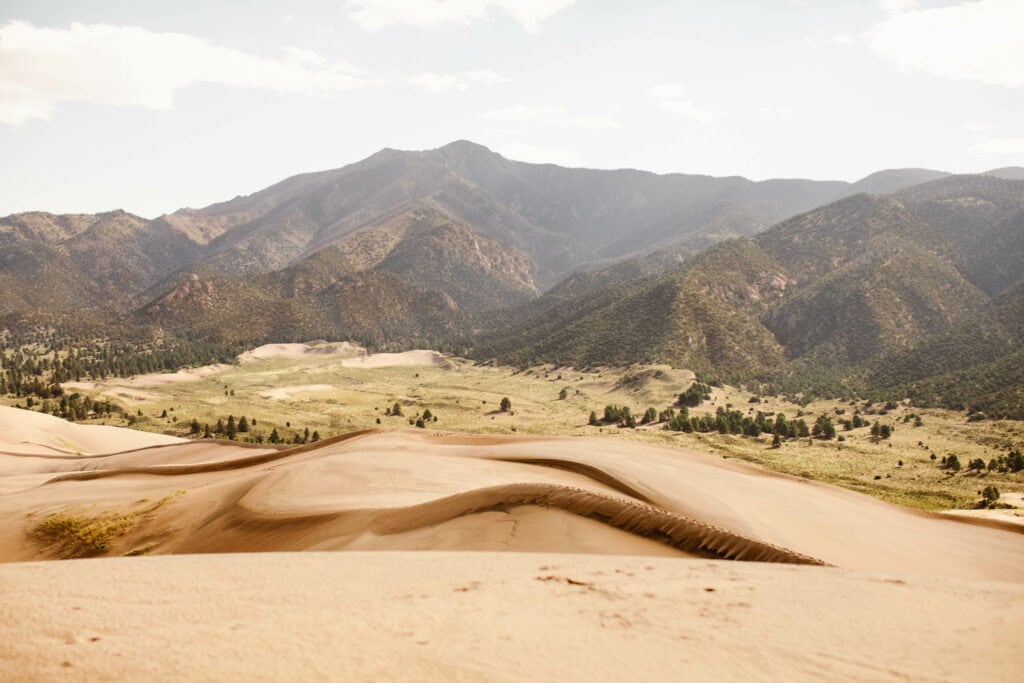 living in Colorado means having access to national parks like Great Sand Dunes, which is home to North America's tallest dune and the Sangre de Cristo Mountains in the background