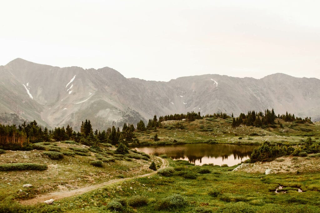 view of the second lake on pass lake trail on Loveland Pass on a summer morning
