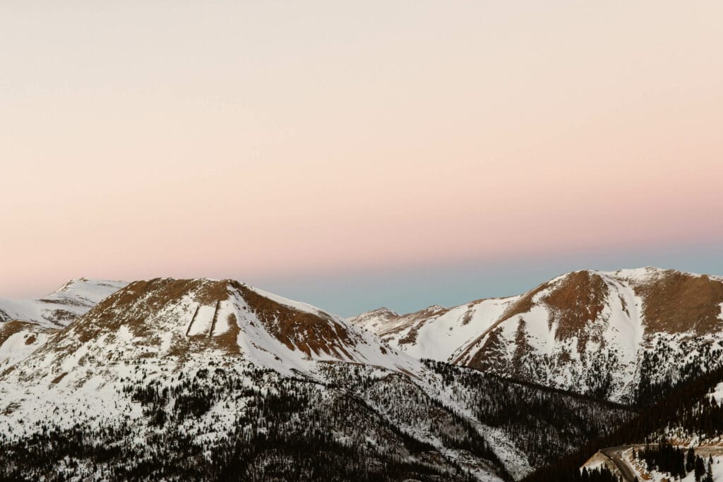pink sunset on West Ridge hiking trail on Loveland Pass Colorado in the winter