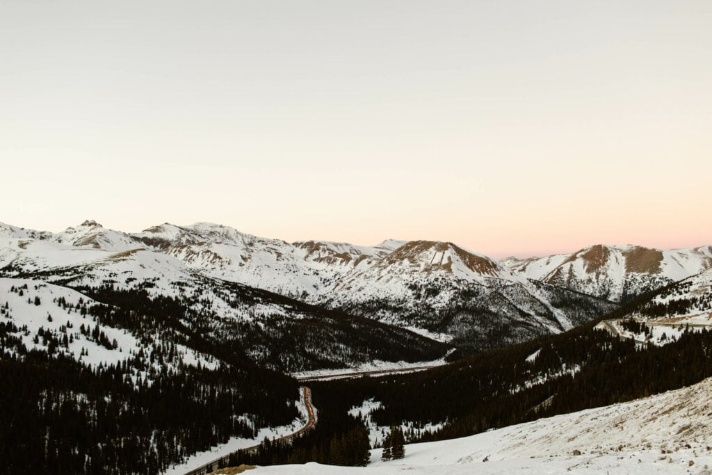 view of i70 from the continental divide overlook on Loveland Pass on a winter evening