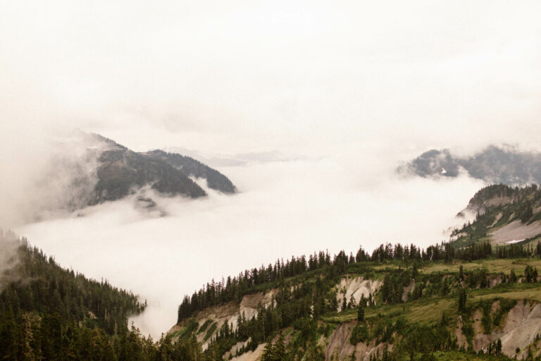 moody weather and a large cloud inversion in a valley as seen on a hike at Artist Point in the Mt Baker Wilderness in Washington