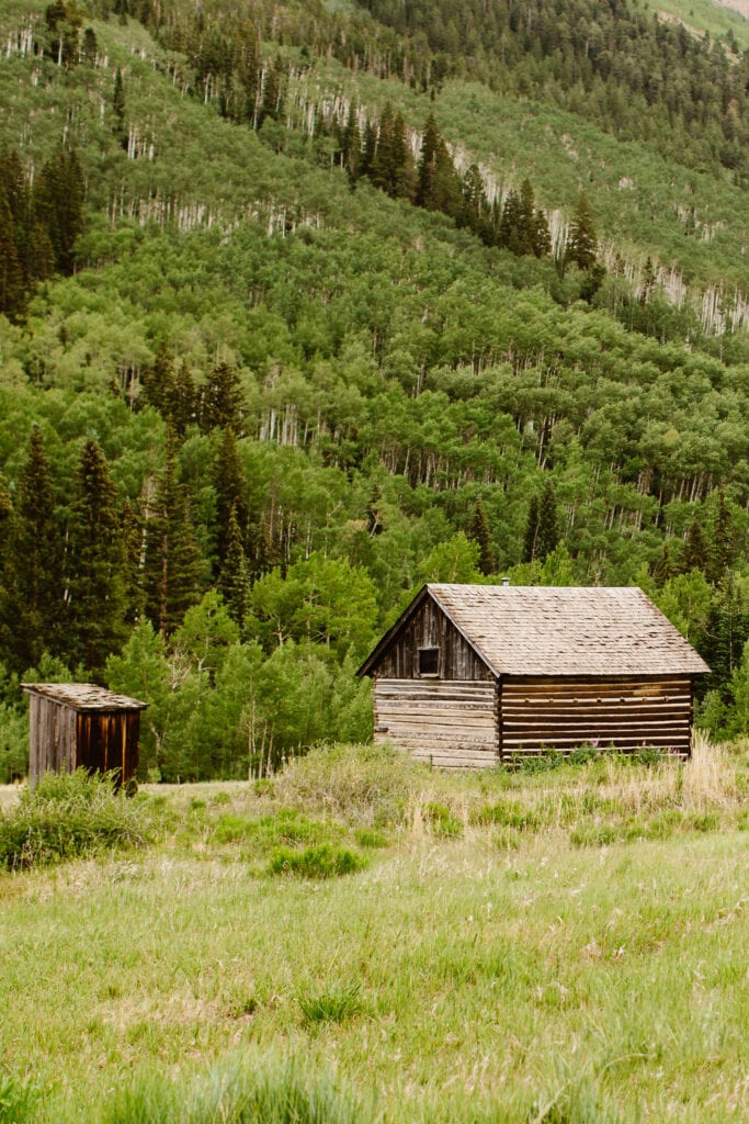 view of a log cabin in Ashcroft Ghost Town Colorado in summer