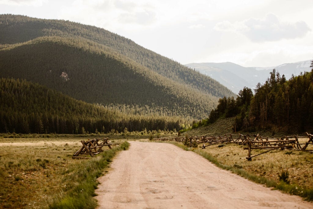 dirt road leading to a campground in a mountain valley located along Guanella Pass